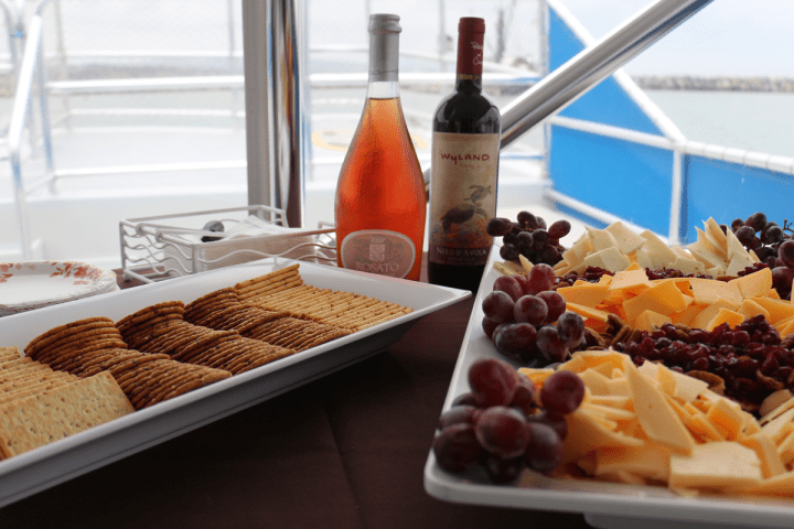 a plate of food and a bottle on a table